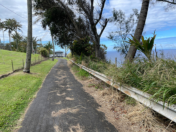 along guardrail adjacent to landslide